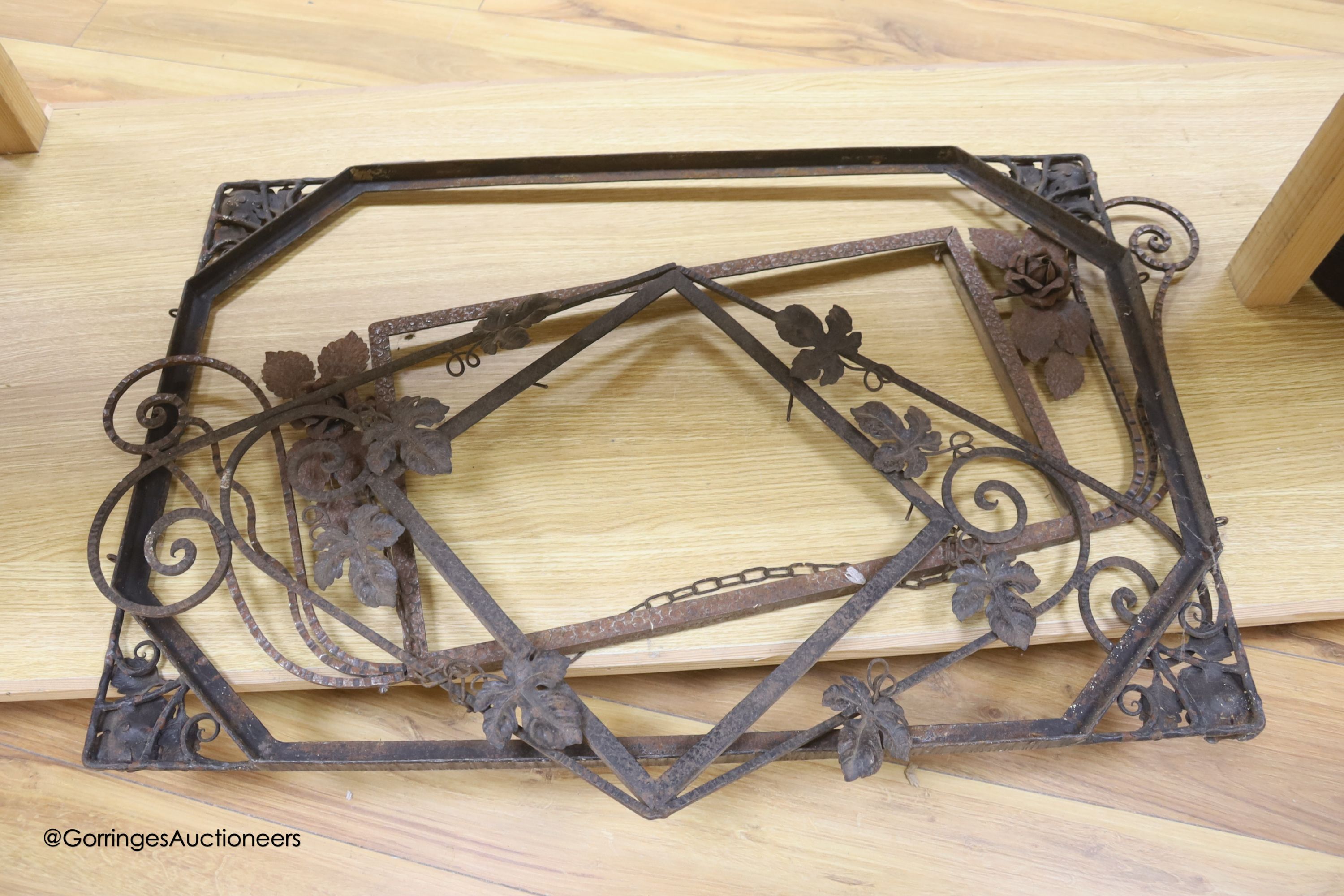 Three wrought iron metal frames, largest 80 x 56cm